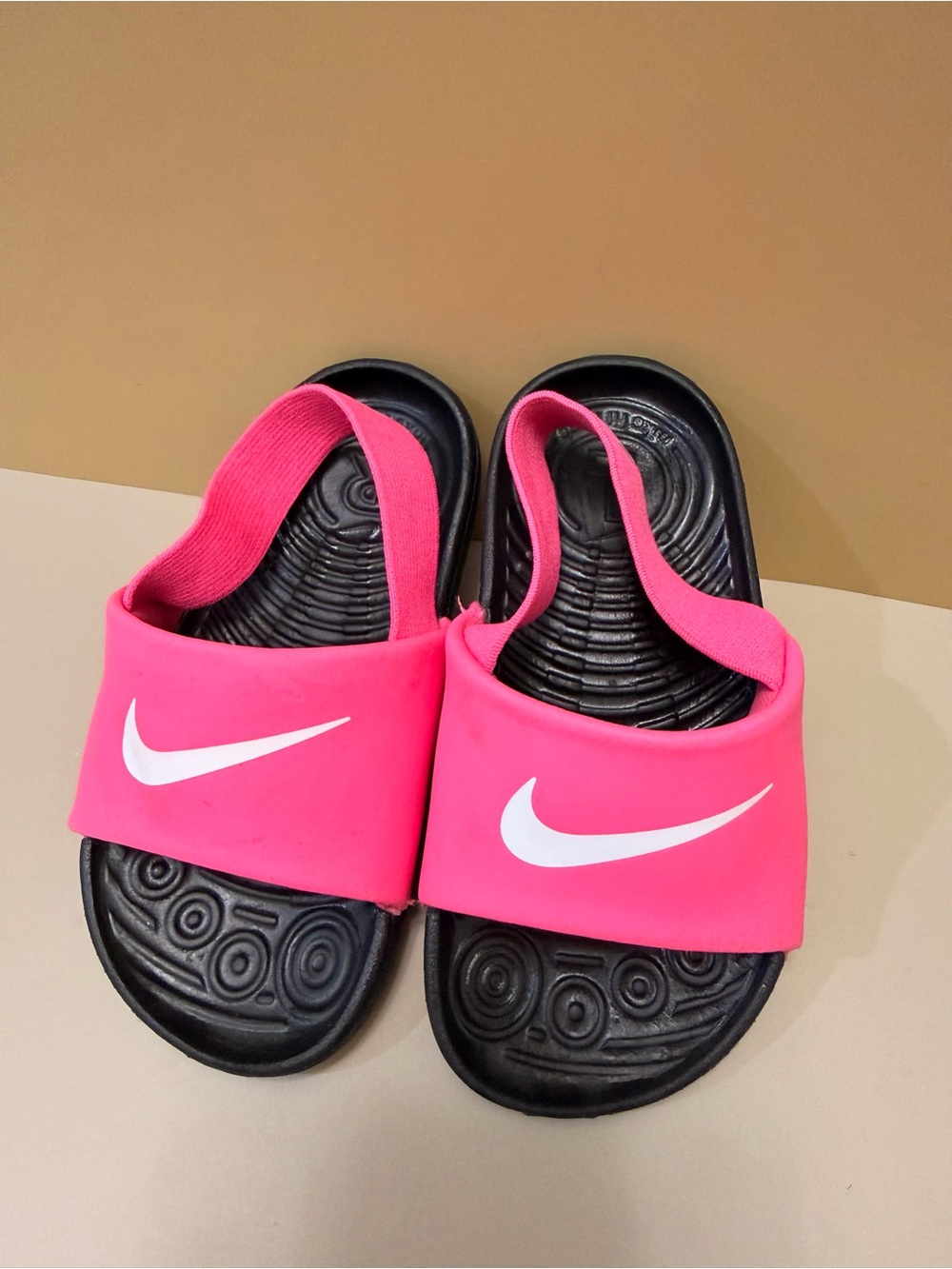 Nike Bright Pink Slide Sandals with White Swoosh and Black Footbed